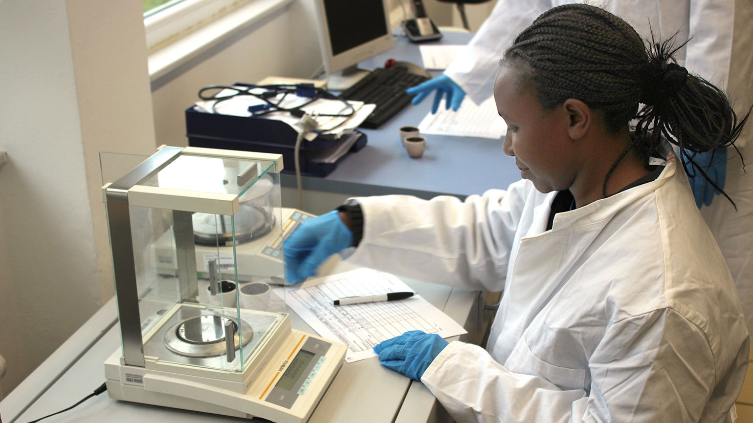 woman from Africa working in a lab