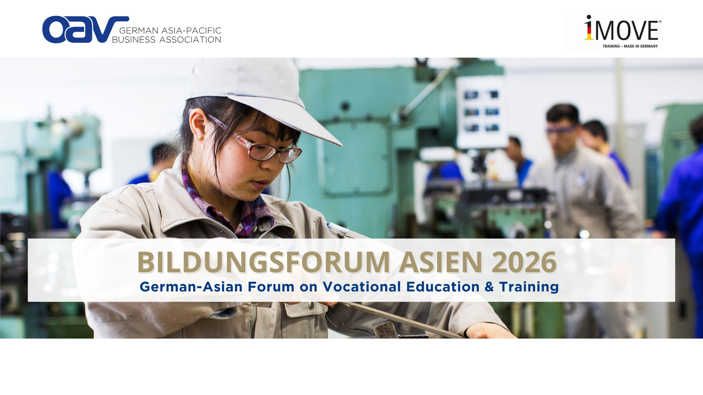 A young Chinese woman in a training workshop files a workpiece that is clamped in a vice.