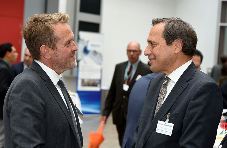 two men in a discussion