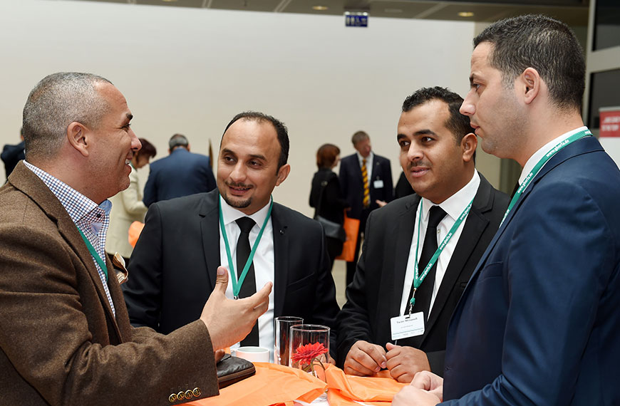 several people standing together in discussion