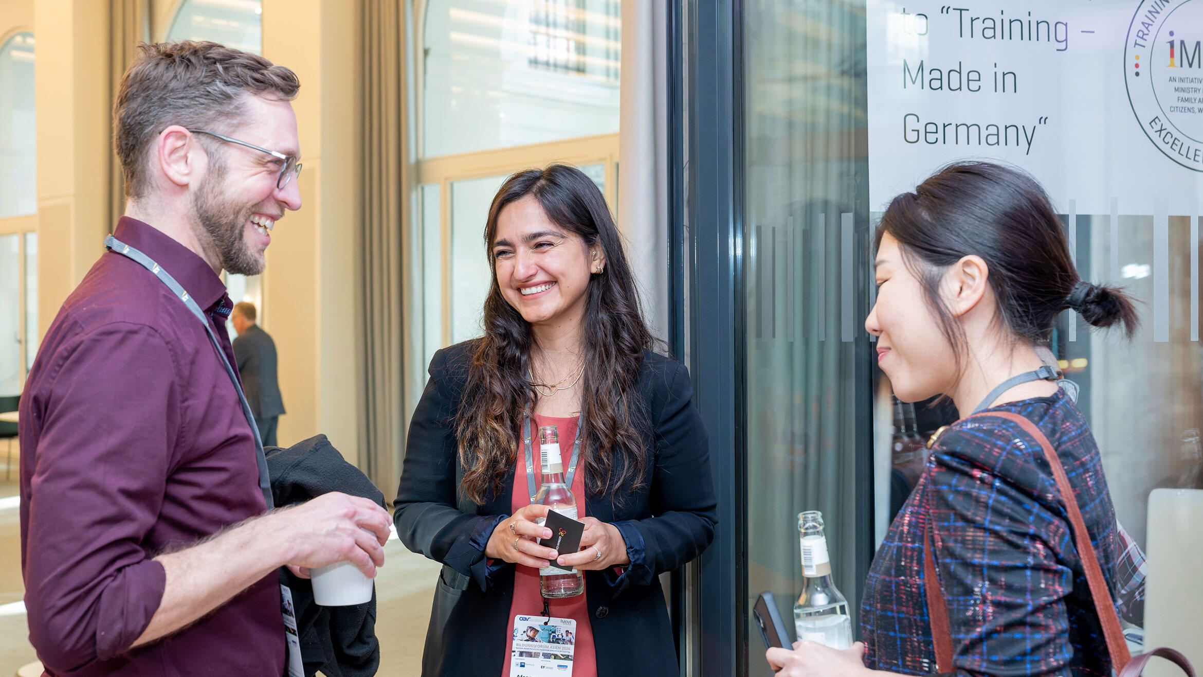 a man and two women in discussion