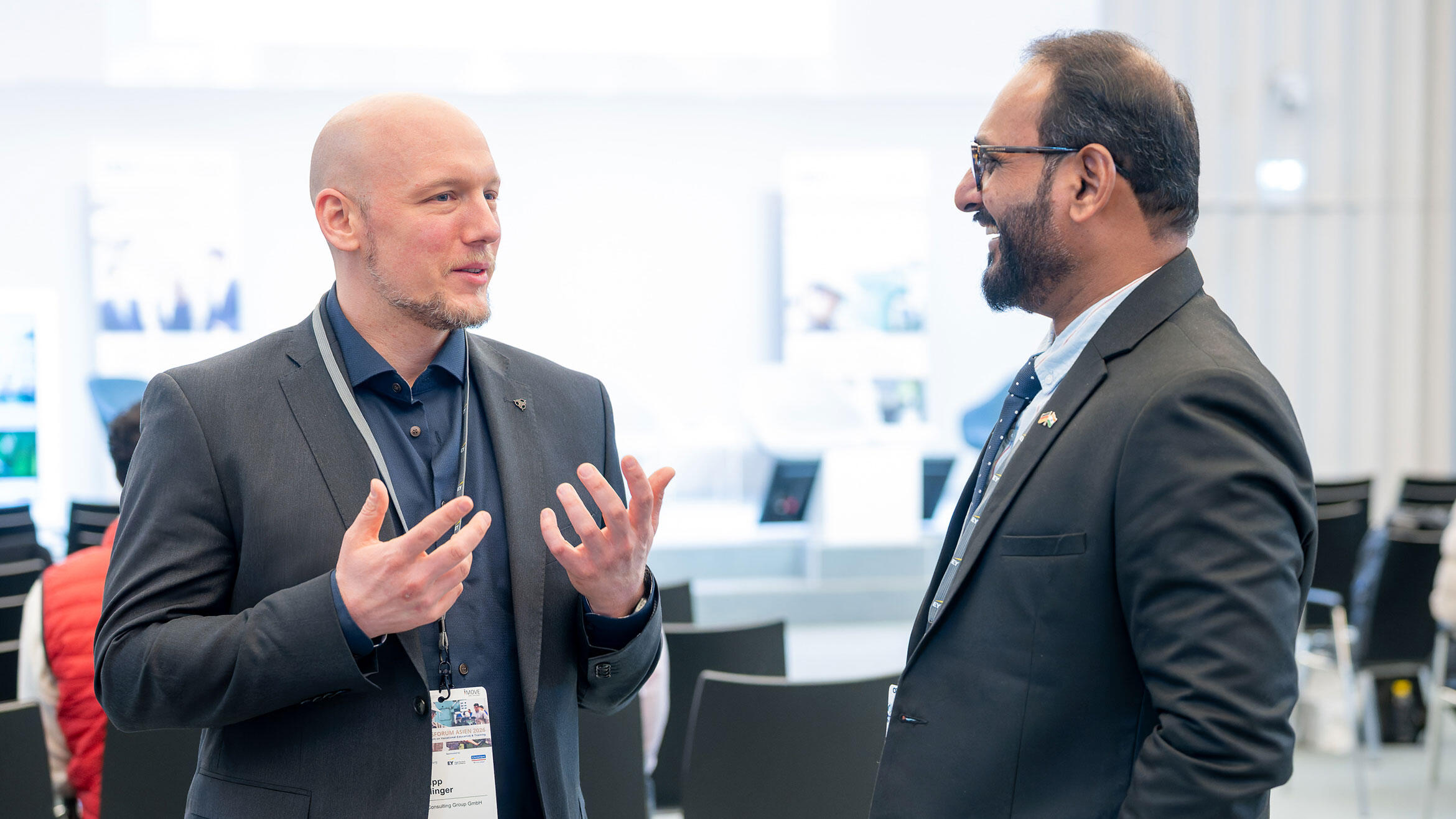 two men in a discussion