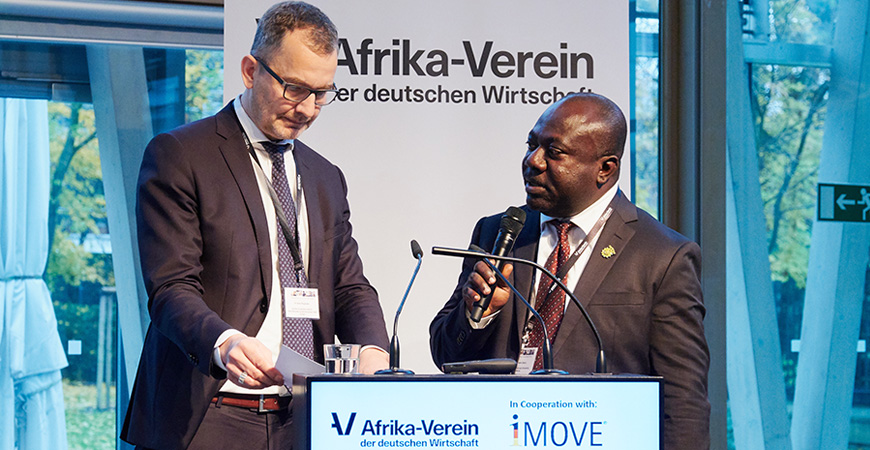 close-up of two men at the lectern