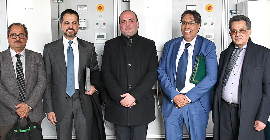 group picture of five arab people