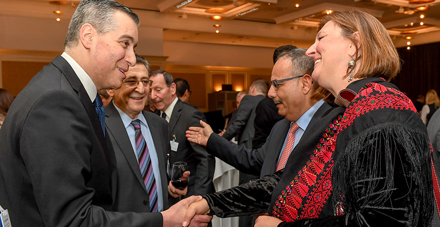 several people standing together in discussion