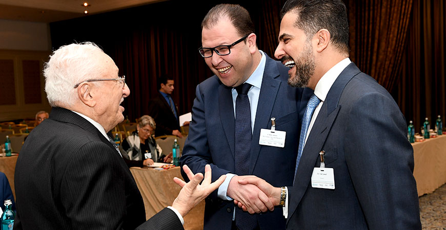 several people standing together in discussion