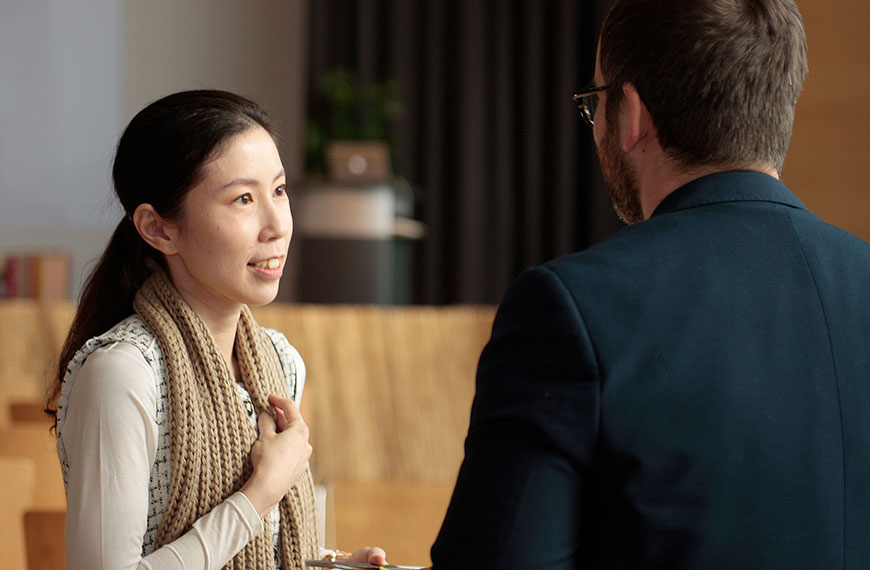 Two people in conversation