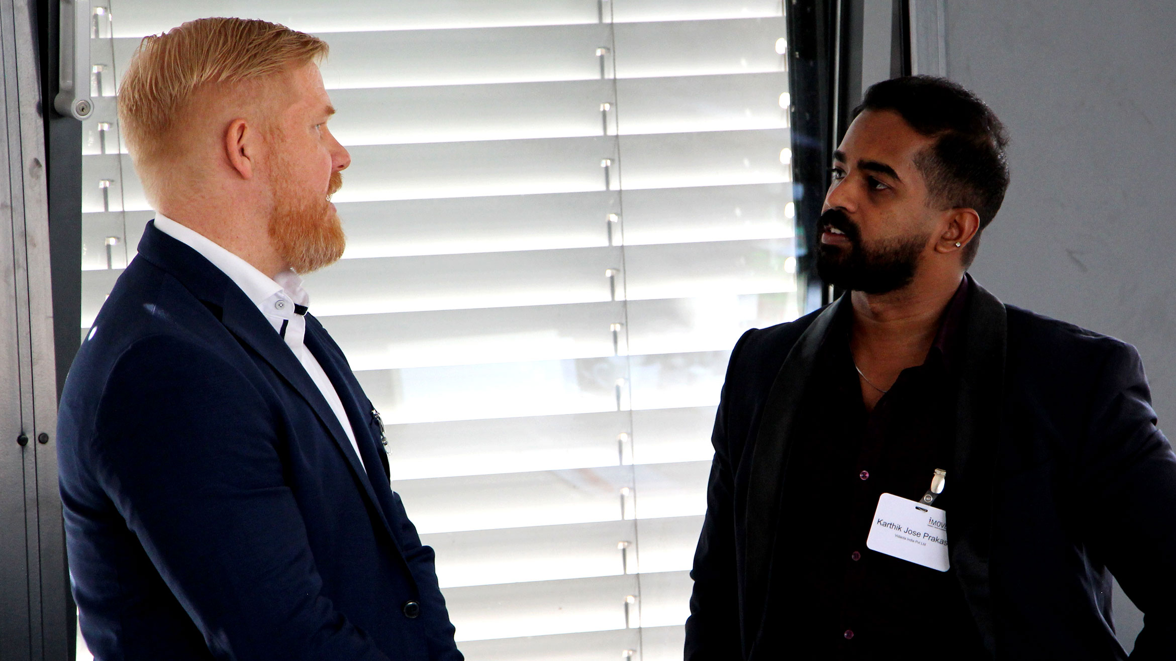 Two men in conversation