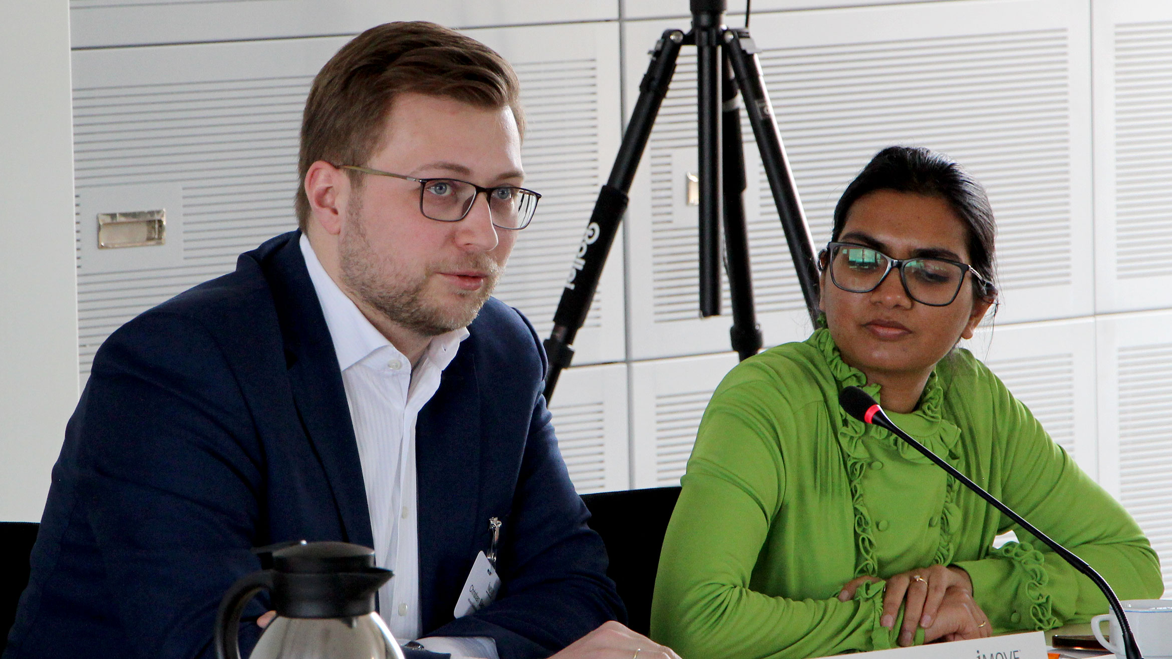 two participants sitting at the table