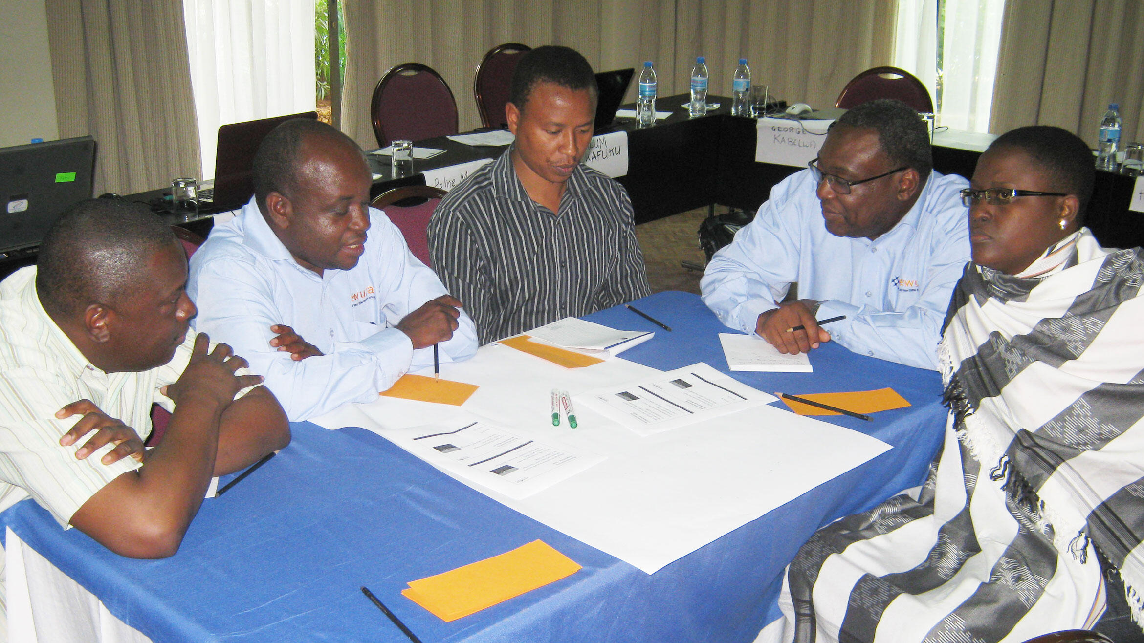 five people from Africa in a working group