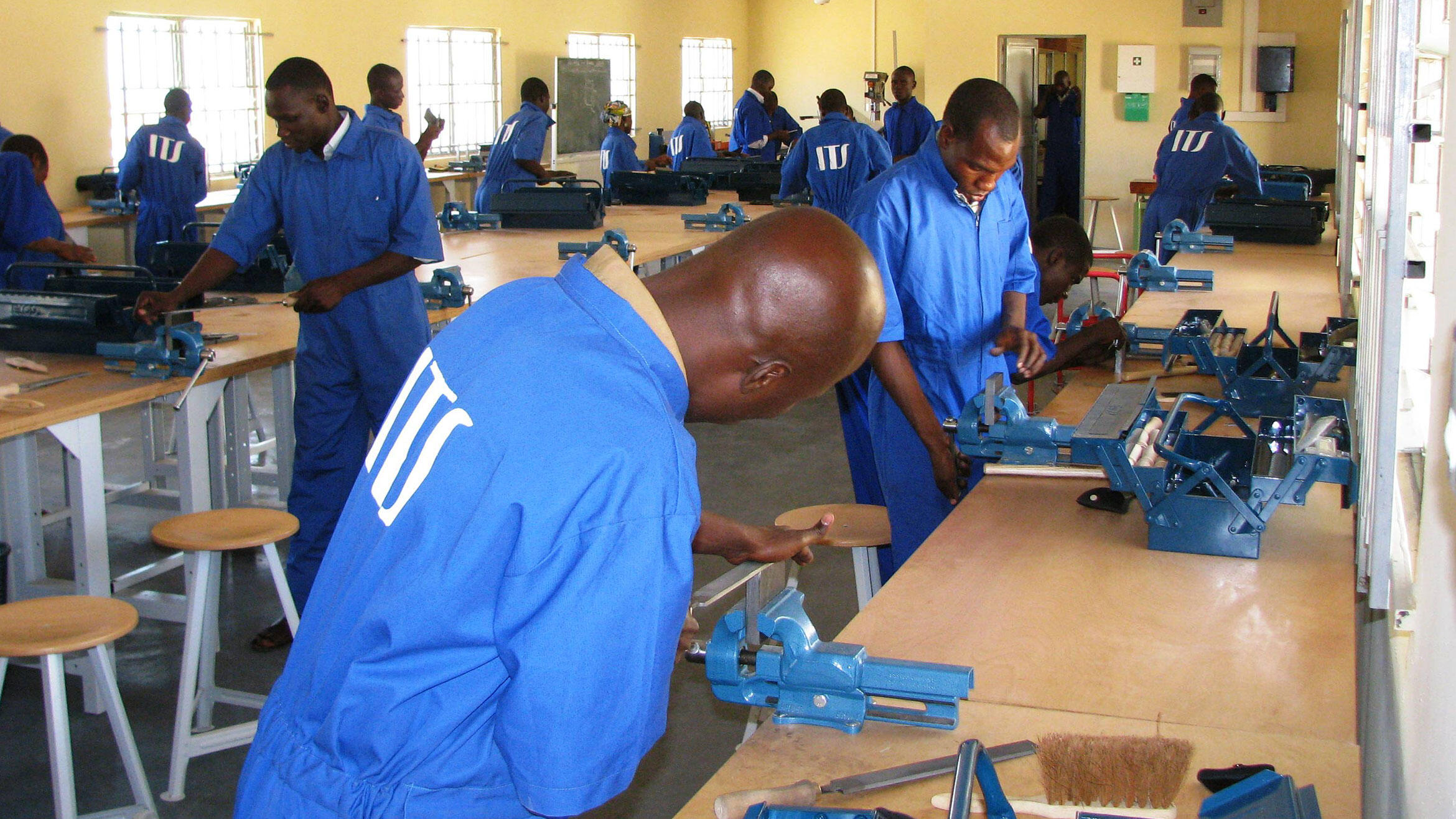 Nigerians practising in a teaching workshop