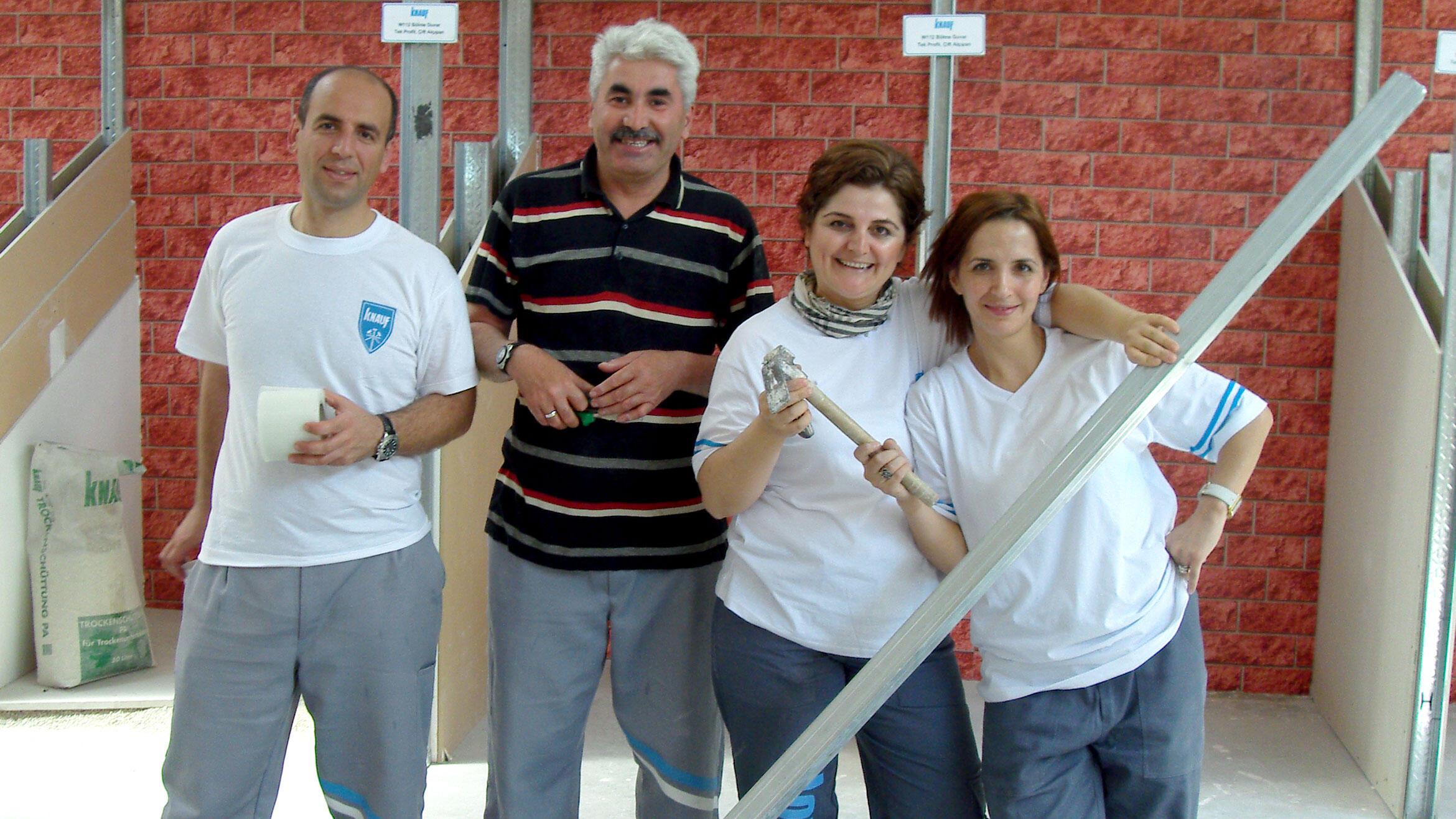 group picture with four people smiling