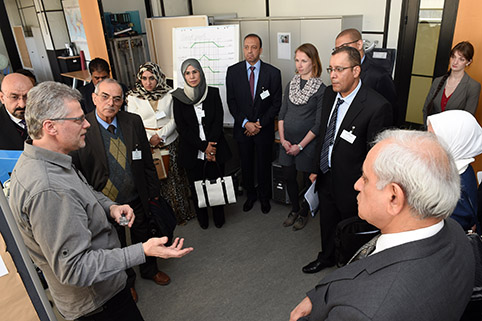 man addressing the group of visitors