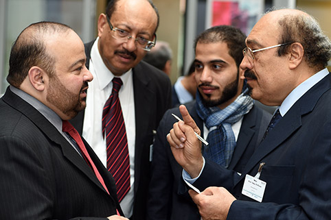 conversation amongst several participants during a break