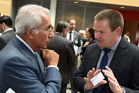 close-up of a conversation amongst two participants during a break