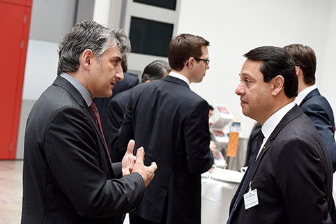 close-up of a conversation amongst two participants during a break