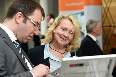 close-up of a conversation amongst two participants during a break
