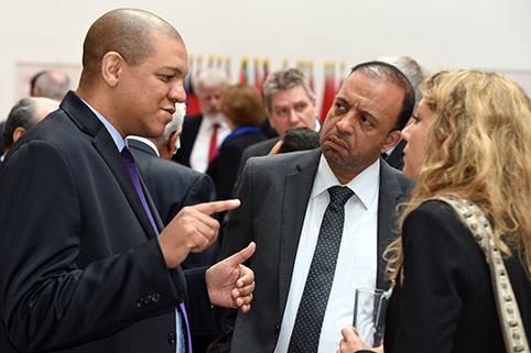 conversation amongst several participants during a break