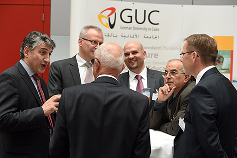 conversation amongst several participants during a break