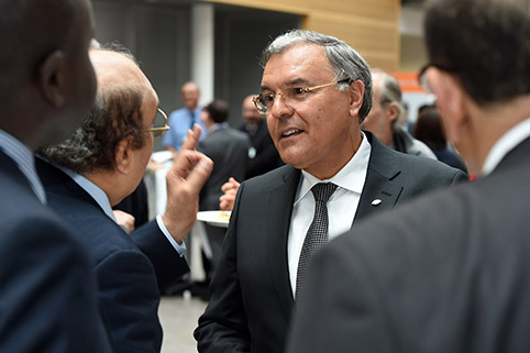 close-up of a conversation amongst several participants during a break