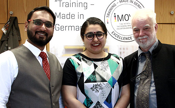 group picture with iMOVE logo in the background