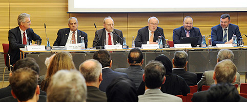 participants and chair of the session on the podium