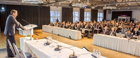 view into the conference room from the speaker to the audience