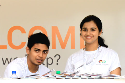 Two Young Indians at the Information Stand