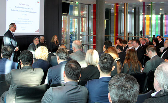 View into the well filled conference room