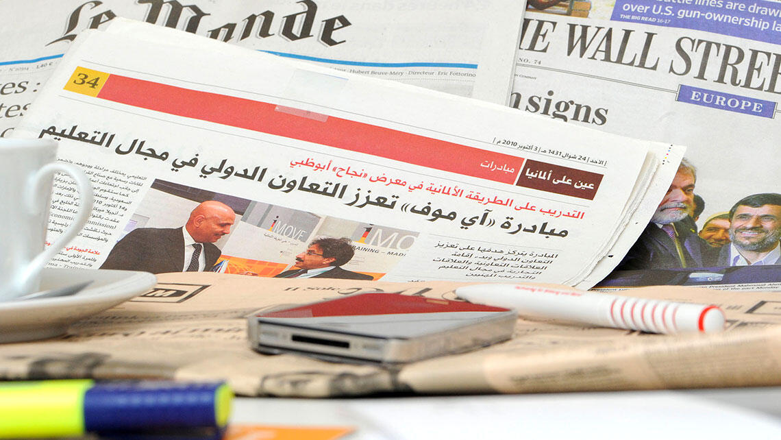 still life with various international newspapers