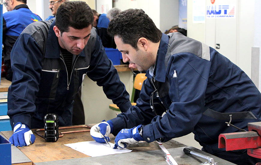 Training scene in a workshop