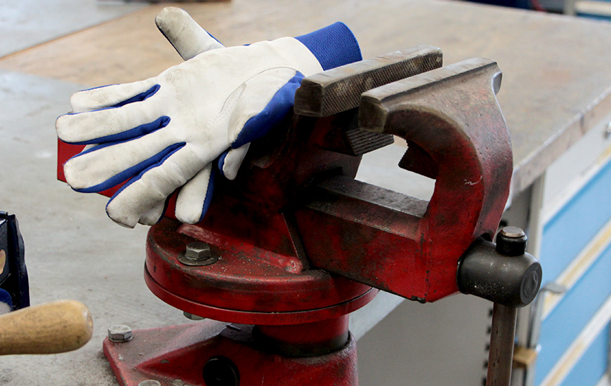 Still life: Working gloves and vice