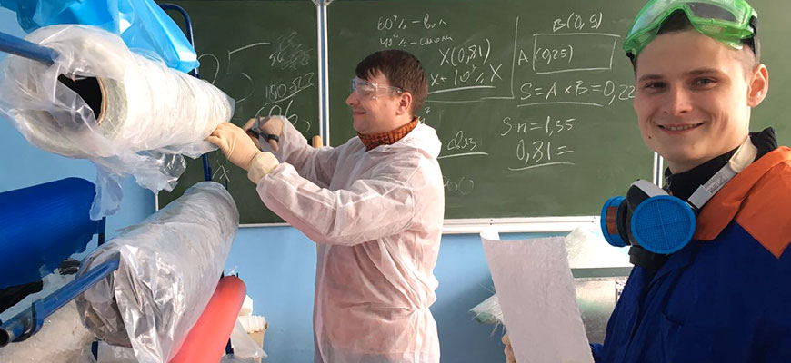 two young russians working with plastics