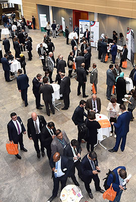 View from above of attendants standing in small groups