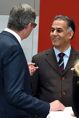 two people in discussion