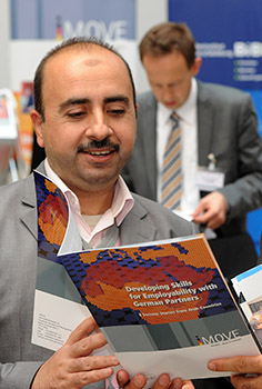 man reads in an iMOVE publication