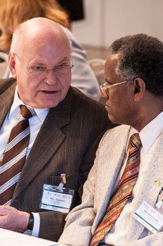 close up of two men in a discussion