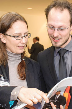 Woman and man looking at a brochure