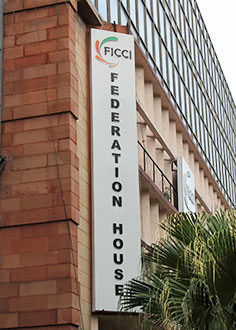 large building with FICCI logo and the writing Federation House