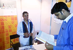 a woman and a man at the iMOVE stand