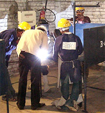 people welding