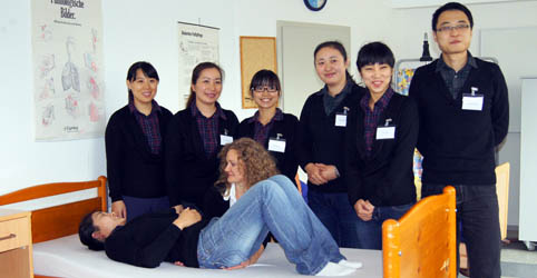 Chinese trainees receiving training in elderly care