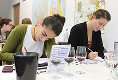 two female students during class at tables