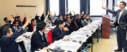 Students of Eckert Schulen in a classroom with lecturer