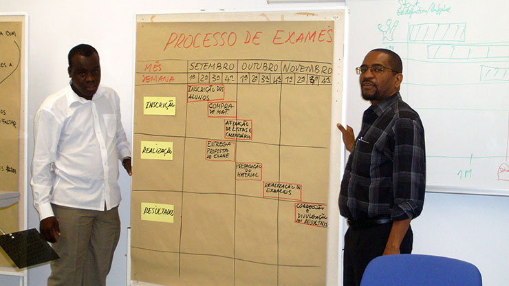 man from Mozambique standing at a flip chart