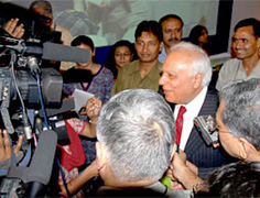 Union Minister Kapil Sibal (Human Resource Development) in the center of media interest